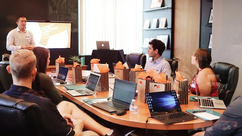 Marketing team strategic planning session around a conference table