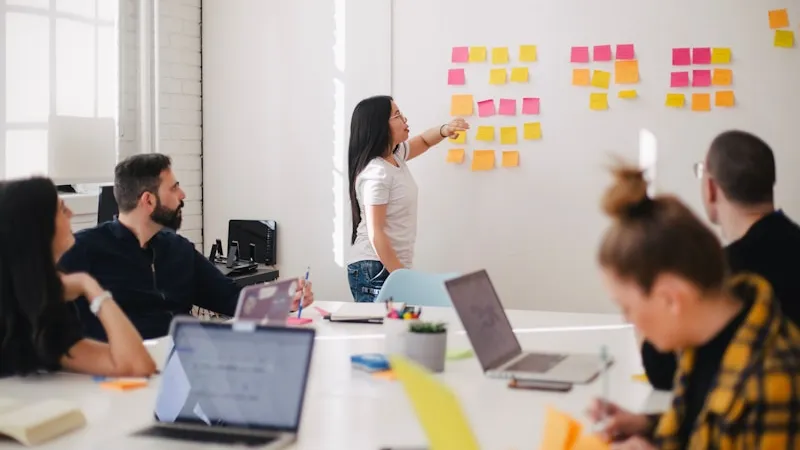 Marketing team reviewing testimonial usage across multiple platforms